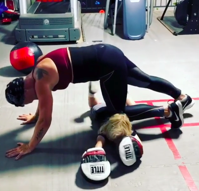 Pink Works Out While Entertaining Son