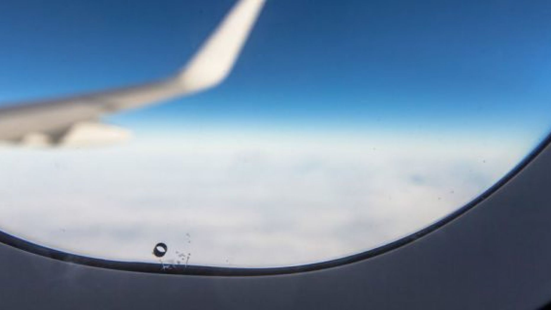 Tiny Hole In Airplane Windows